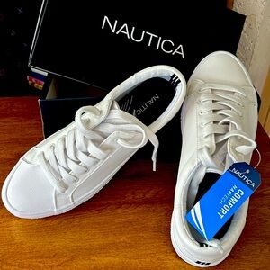 Ladies athletic shoes. New with tag. Size 9.5. Still in box.